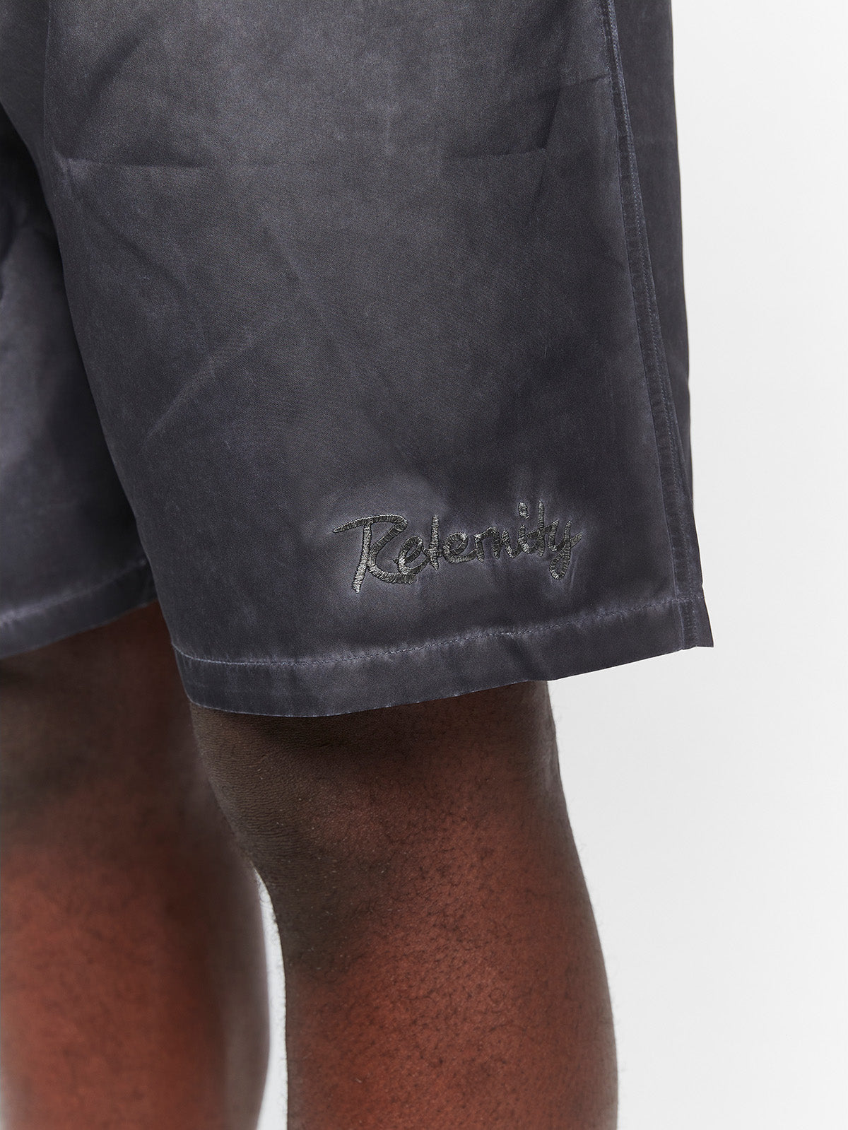 OIL WASHED SWIM SHORTS - BLACK