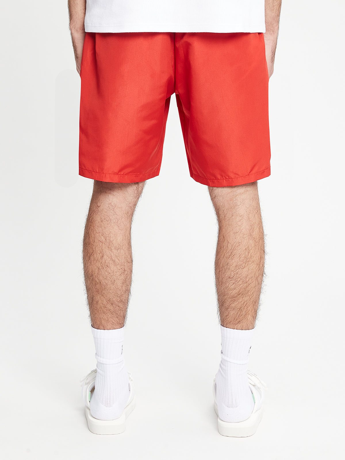 SWIM SHORTS SYMBOL - LAVA RED